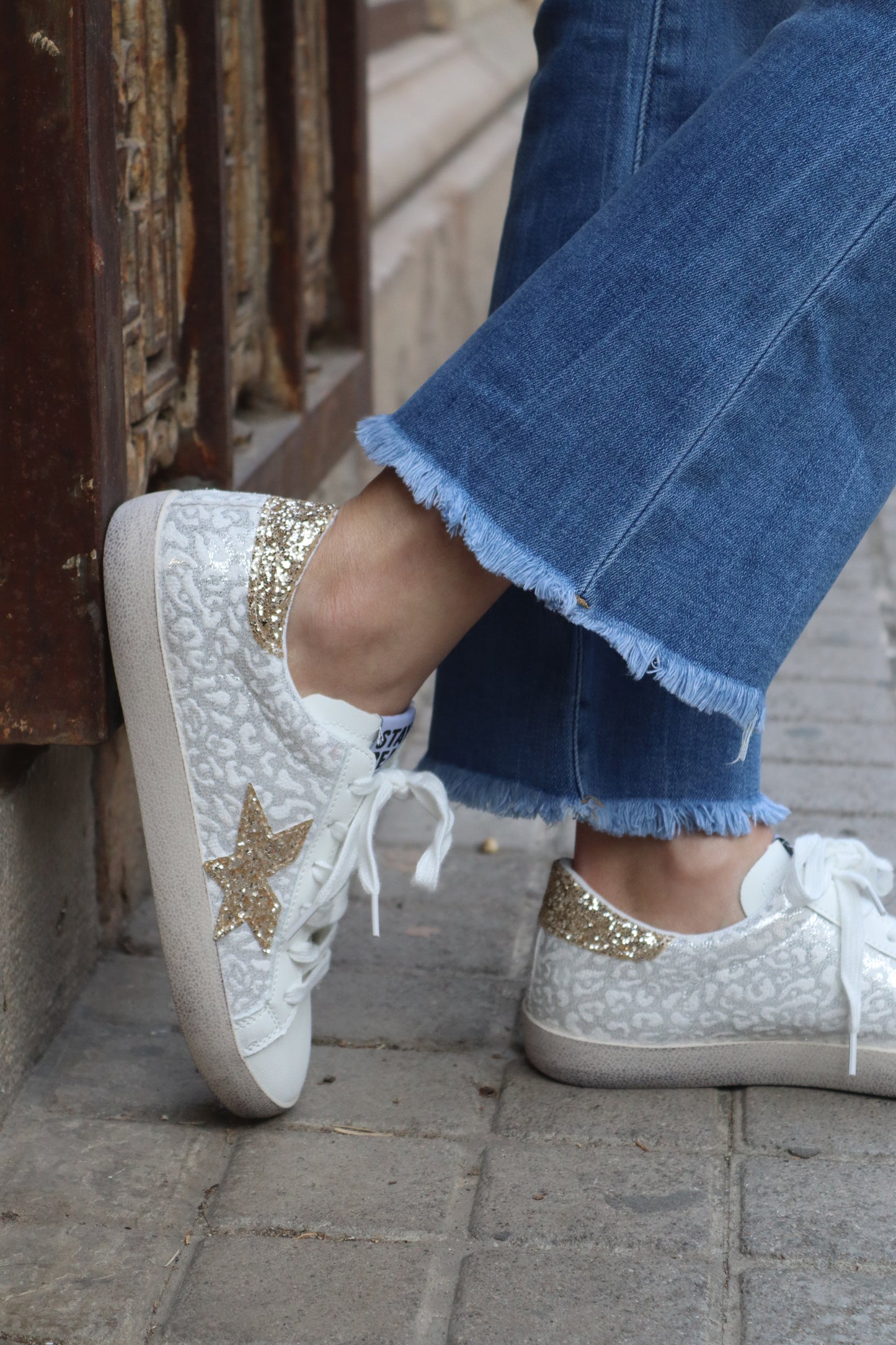 ZAPATILLA ANIMAL PRINT DORADA