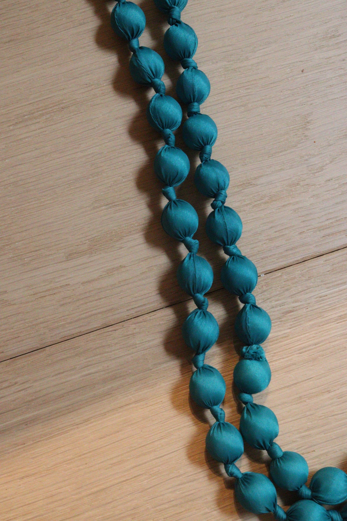 COLLAR BOLAS PETROLEO