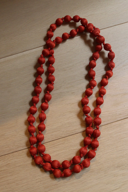 COLLAR BOLAS TEJA